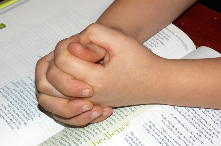 child hands pray